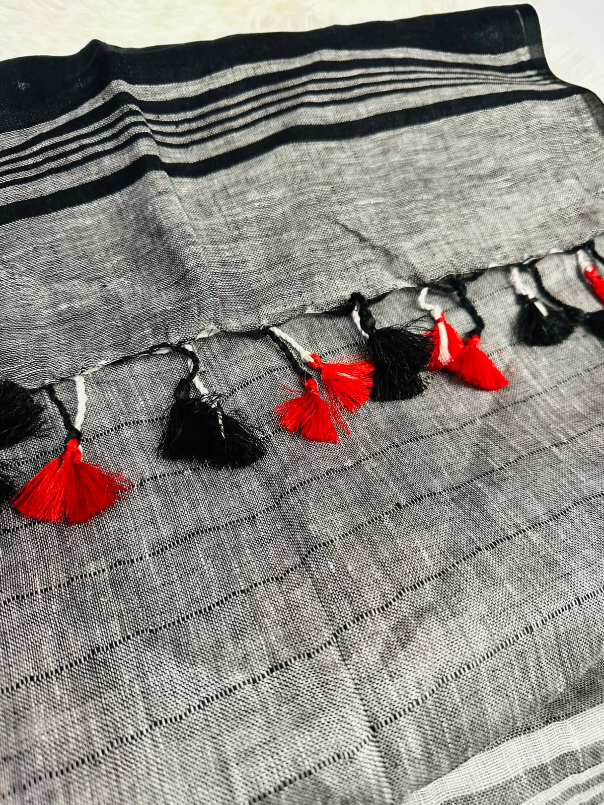 vory Linen Silk Saree with Eiffel Tower Motifs & Black Red Border