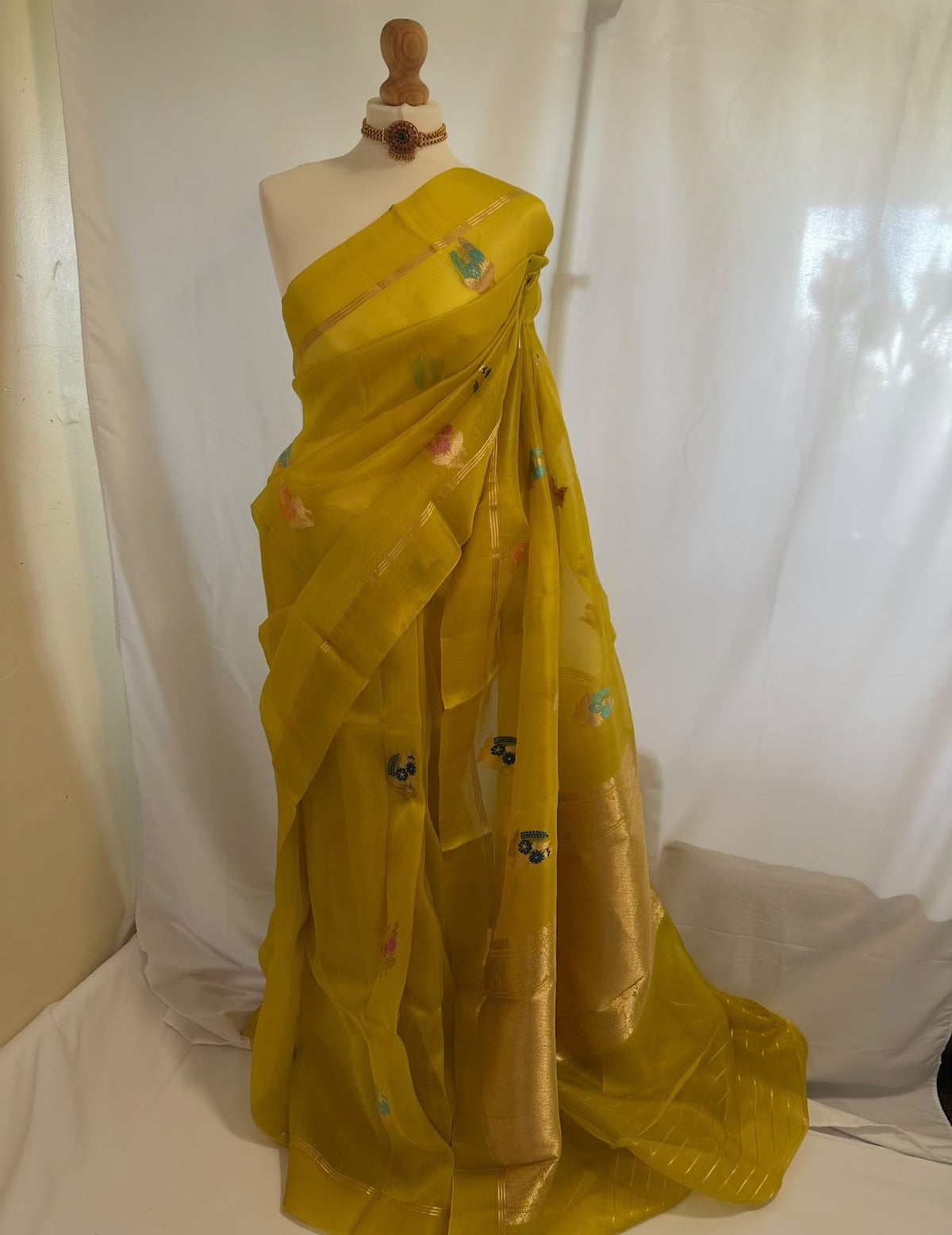 Mustard Green Banarasi Silk Saree with Gold Zari & Floral Motifs